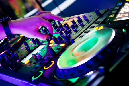Dj mixes the track in the nightclub at a partyの写真素材