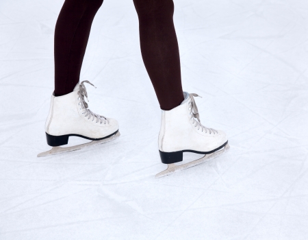 Feet skater standing on the iceの写真素材