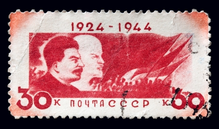 USSR - CIRCA 1944: A postage stamp printed in USSR shows "Lenin and Stalin" , circa 1944のeditorial素材