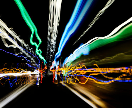 Light traces of the machine in a long tunnel. Long exposure