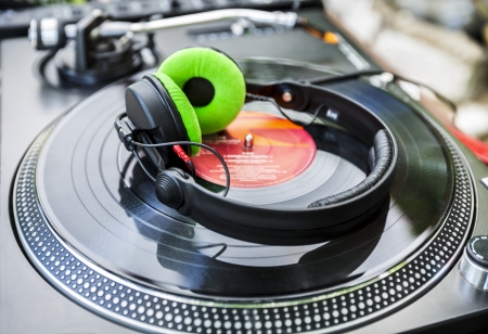Dj mixer and Vinyl Player with headphones at club. Soft focusの写真素材
