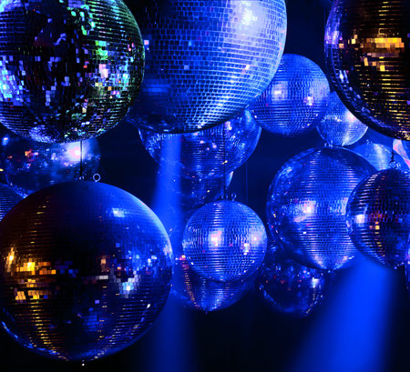 Party lights disco ball at nightclub
