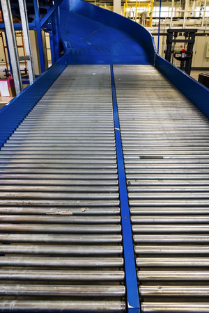 Factory roller conveyor system for transporting cratesの写真素材