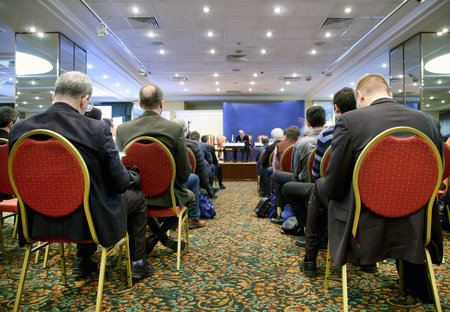 People at the conference hall. Rear view