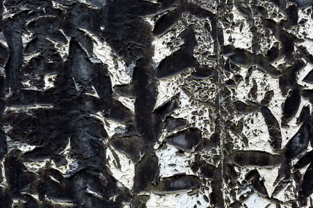 Background of roofing of the old tar paper material on outdoor surface closeupの写真素材