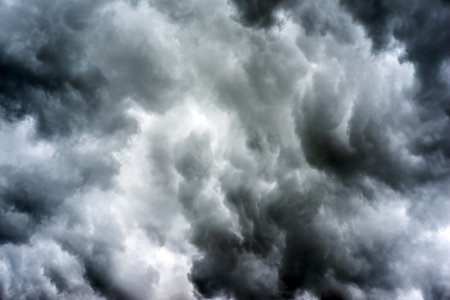 Beautiful dark ominous grey storm clouds. Dramatic sky, like apocalypse
