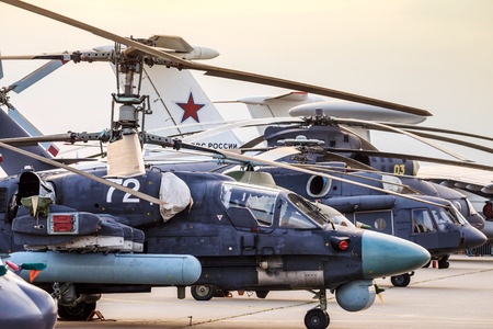 ZHUKOVSKY, RUSSIA - AUG 26, 2015: Helicopters and planes on Airplane shown at International Aerospace Salon MAKS-2015 on august 27, 2015 in Zhukovsky, Moscow region, Russiaのeditorial素材
