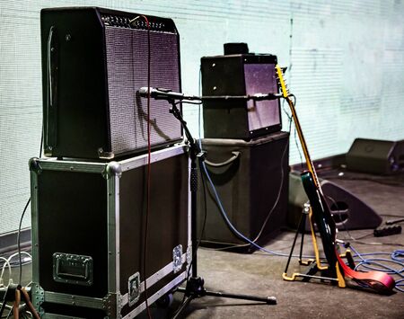 Rock concert stage with musical instruments and amplifier sound speakersの写真素材