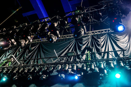 Vector stage spotlight with lighting equipment on the concert stage