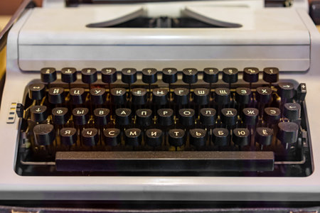 Old typewriter with Russian letters close up 