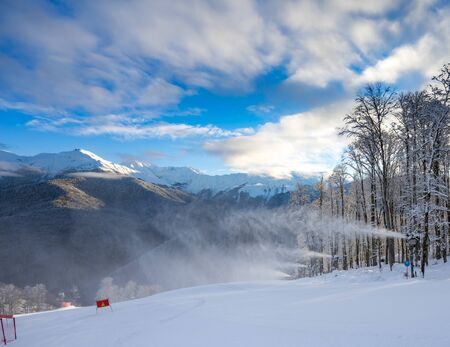 Snow gun on the ski slope of beautiful landscape of the Caucasus mountainsの写真素材