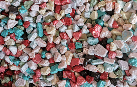 Bunch of sweets dragees with multicolored glaze closeup. Candy backgroundの写真素材