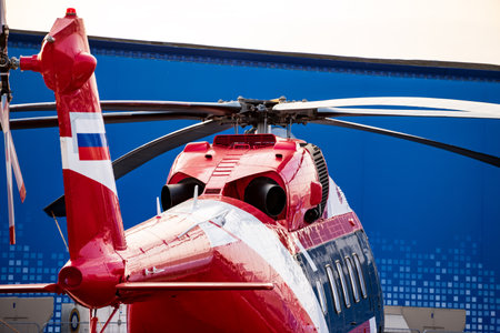 Modern helicopter with rotor blades and tail rotor part close upの写真素材