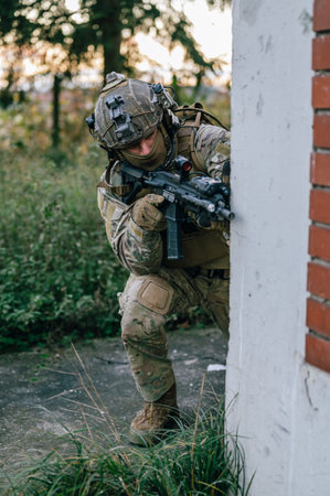 Portrait of a special forces soldier with assault rifle in action.の写真素材