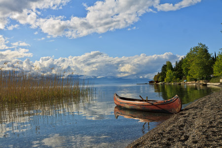 Ohrid Lake with a nice Kanu, beautiful reflection and nice colors, Lagadin Ohrid Macedonia.