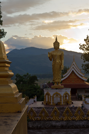Sunset with Buddha Statue Muang Xai, Laosの写真素材