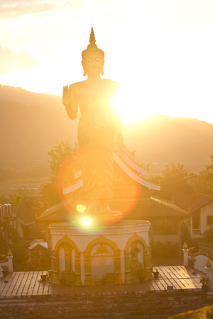 Sunset with Buddha Statue Muang Xai, Laosの写真素材