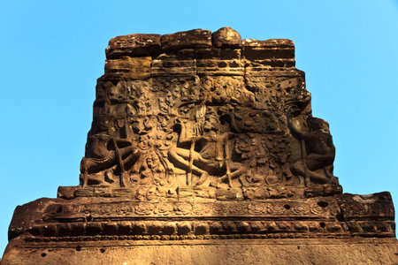 Ancient stone wall stucco sculpture on the antique carving wall at ancient temple Bayon temple