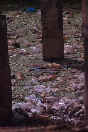 Plastic rubbish pollution in ocean. Photo showing pollution problem of garbage thrown directly into...