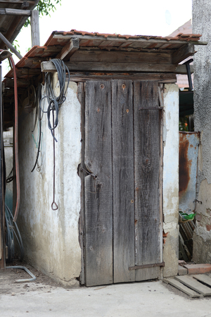 Old wooden toilet in villageの写真素材