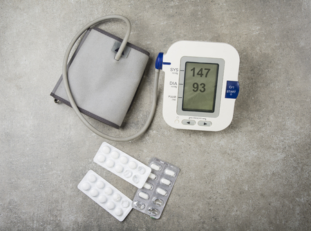 Hypertension concept. High blood pressure with used tablets and pillsの写真素材