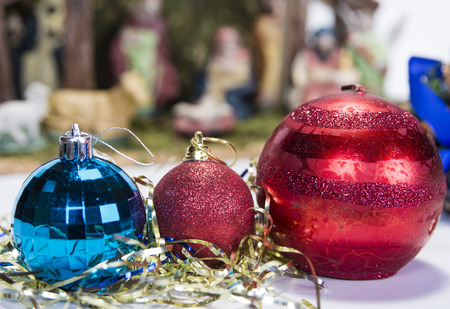 Christmas background with decorations  bells, ribbon and balls on white.の写真素材