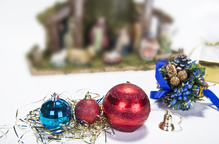 Christmas background with decorations  bells, ribbon and balls on white.の写真素材