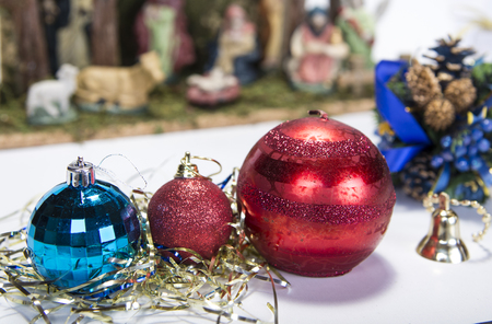 Christmas background with decorations  bells, ribbon and balls on white.の写真素材