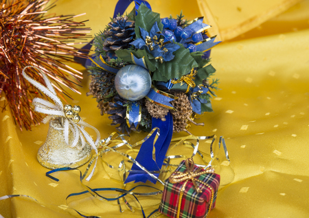Christmas background with decorations  bells, ribbon and ballsの写真素材