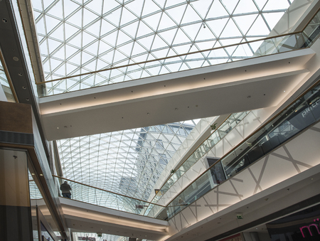 Slovakia, Bratislava - November 5th, 2017 Modern architecture in Shopping centre Eurovia with art statuesのeditorial素材