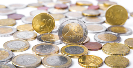 Euro coins on the white backgroundの写真素材