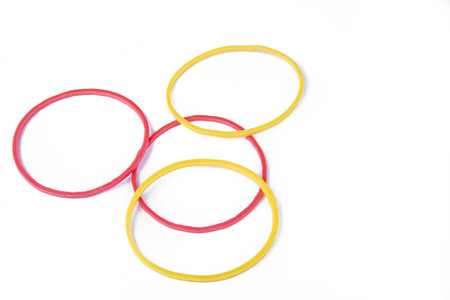 Colorful rubber bands on the white backgroundの写真素材