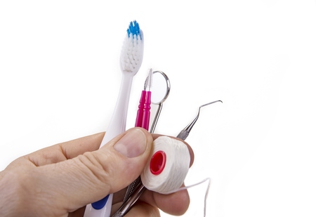 Dental tools with toothbrush interdental pick and flossの写真素材