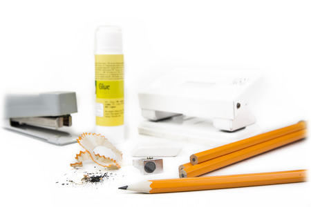 Pencils and sharpener with stapler and puncherの写真素材