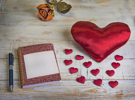 Step by step how to make heart from red satin textile. Valentine's day concept.の写真素材