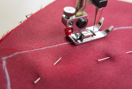 Step by step how to make heart from red satin textile. Valentine's day concept.