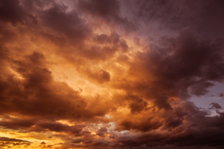 Dramatic Dark cloudy stormy sky in the eveningの写真素材