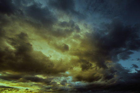 Dramatic Dark cloudy stormy sky in the eveningの写真素材