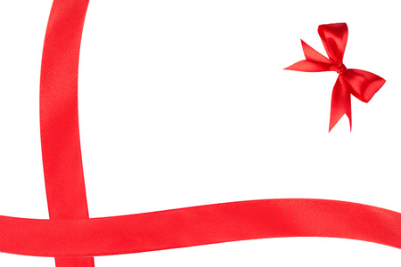 Red bow with the ribbon on the white backgroundの写真素材