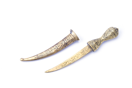 Decorative oriental otoman knife on the white backgroundの写真素材