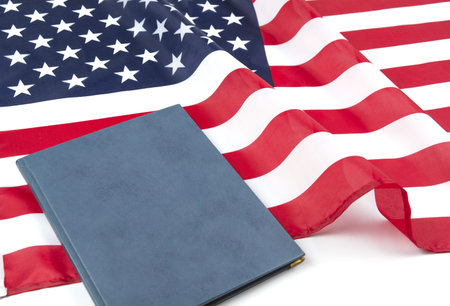 American flag with US constitution or holy bible.の写真素材