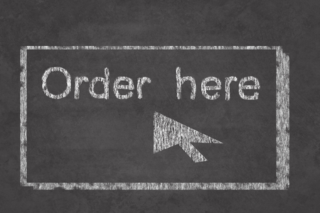 Order here sign on the school chalkboardの写真素材