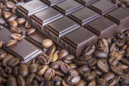 Dark chocolate bars with coffee beans closeupの写真素材