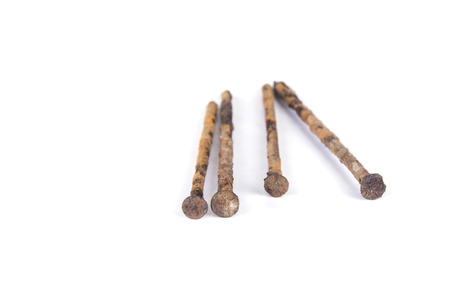 Rusty nails isolated on white backgroundの写真素材
