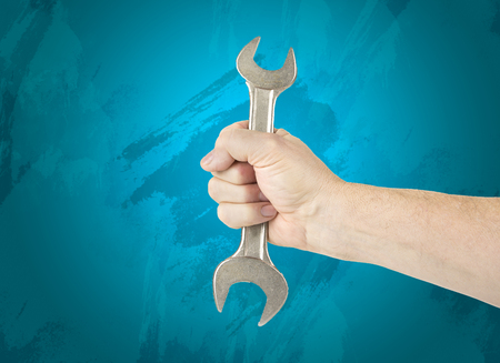 Wrench in the hand. Service conceptの写真素材
