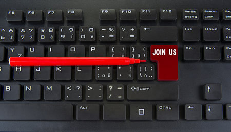 Blank red enter key of computer keyboard. Join us concept