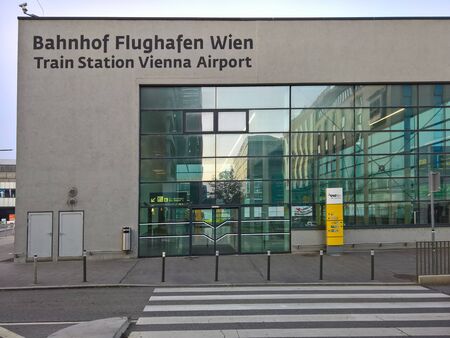 Vienna, Austria, October 13, 2019 .Vienna international airport. Outside buildings with directional signsのeditorial素材