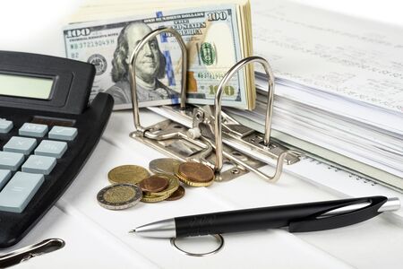 Business and home bookkeeping. Money and taxes concept.の写真素材