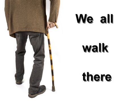 Retired man with cane in jacket on whiteの写真素材
