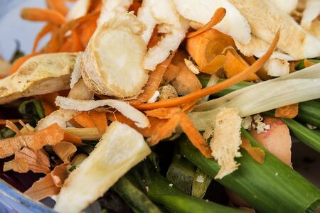 Heap of compost vegetables peelings from cookingの写真素材